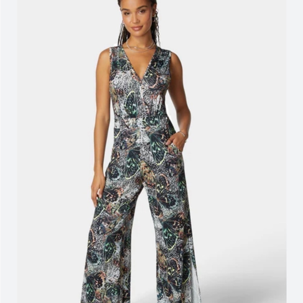 NWT Bebe Sleeveless Butterfly Printed Plunge Neck Size L Jumpsuit!!!